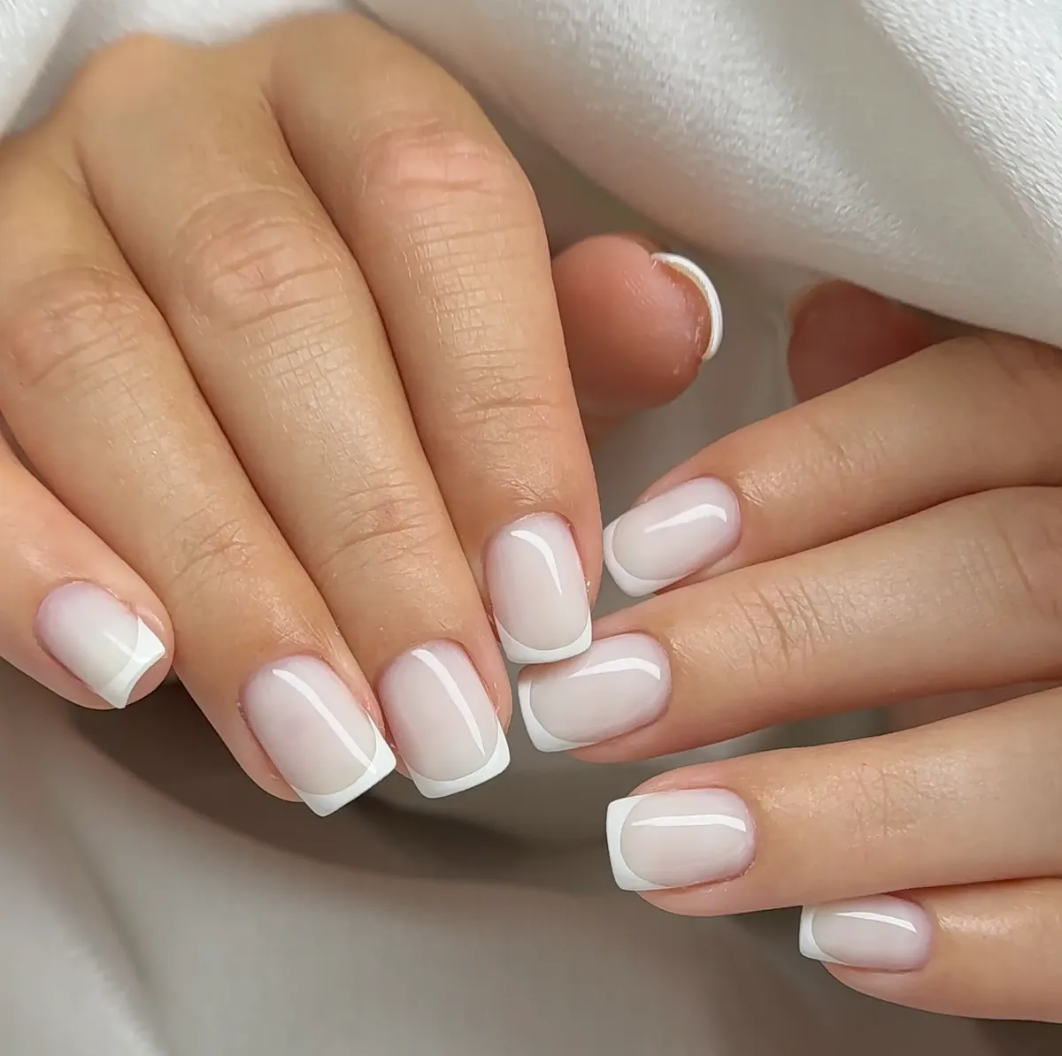 Classic French manicure on squoval nails at Polished by Kim