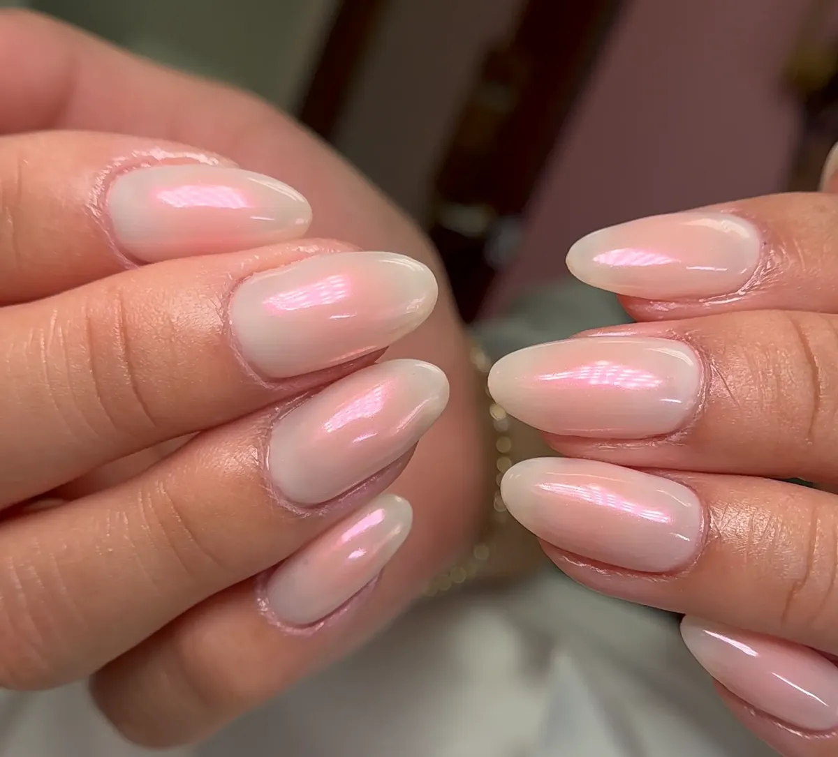 Glazed milky pink chrome almond nails at Polished by Kim The Woodlands