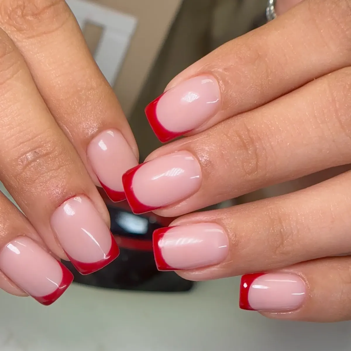 Red French tip square nails at Polished by Kim The Woodlands
