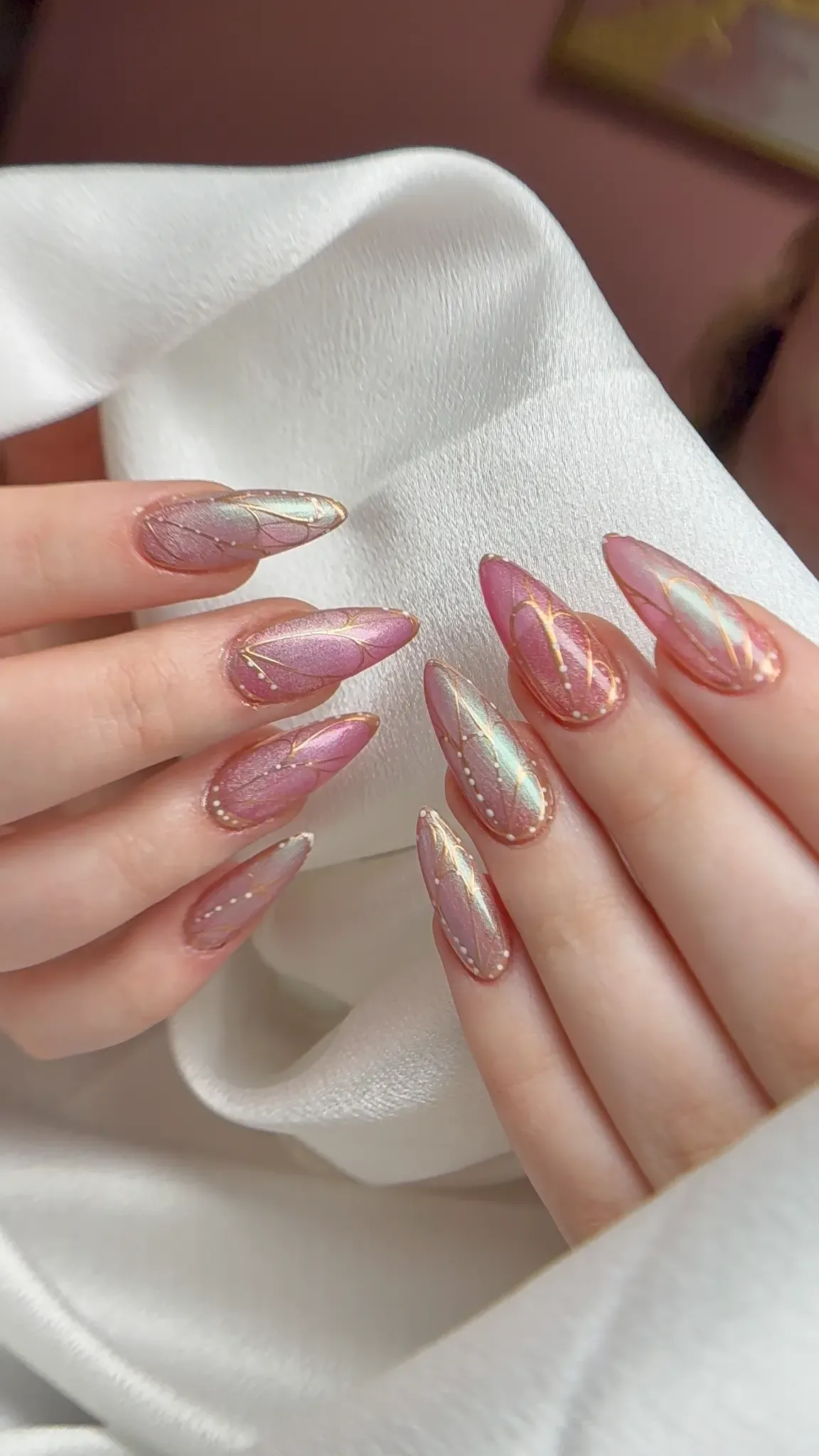 Stiletto iridescent gold nails at Polished by Kim The Woodlands