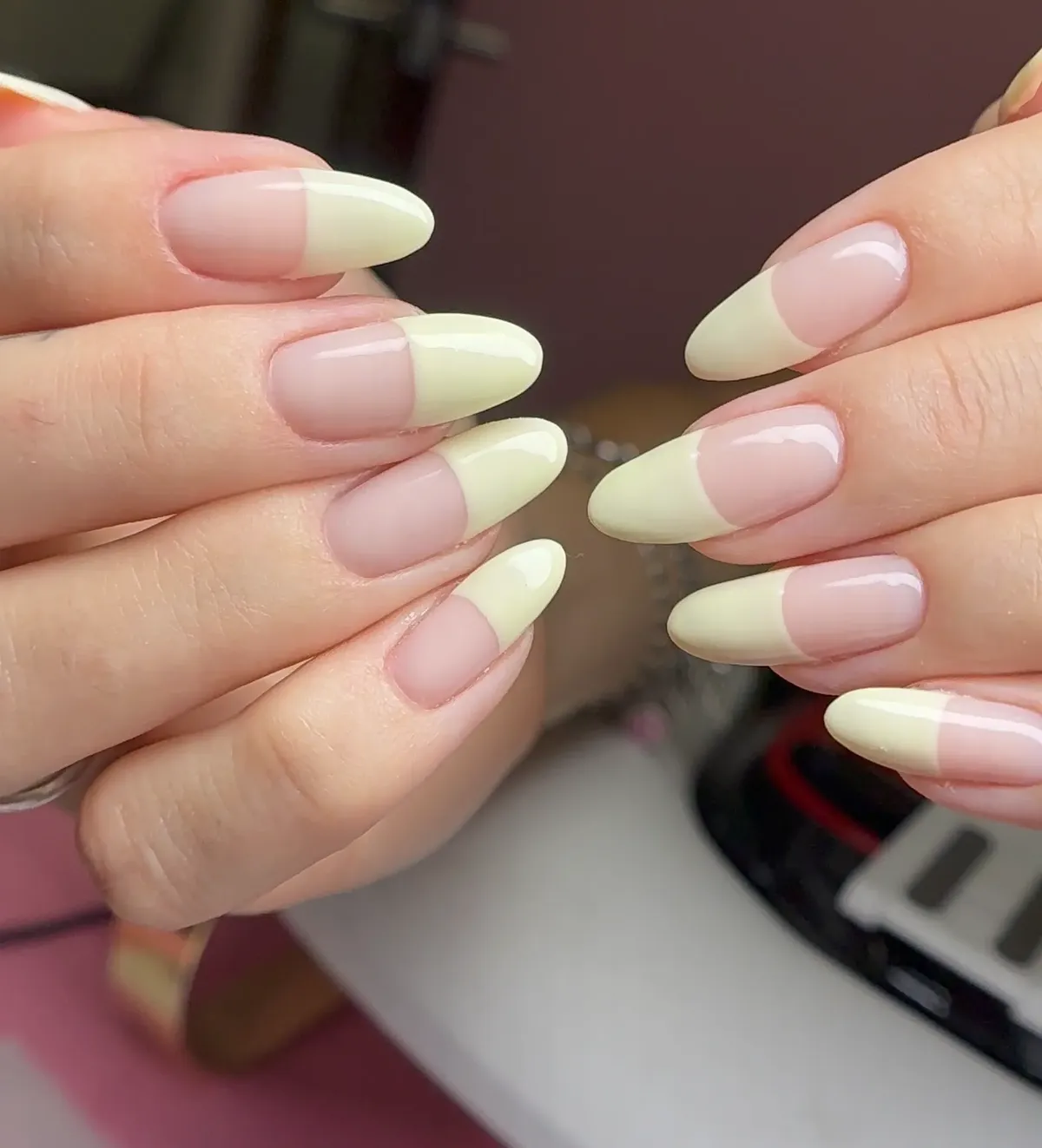 Yellow French tip nails at Polished by Kim The Woodlands
