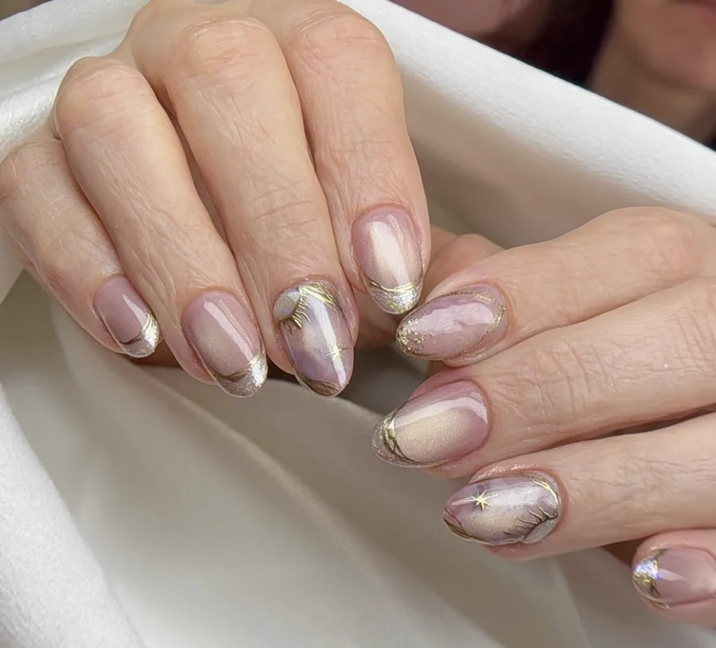 Lavender marble almond nails with gold and silver chrome French tips by Polished by Kim