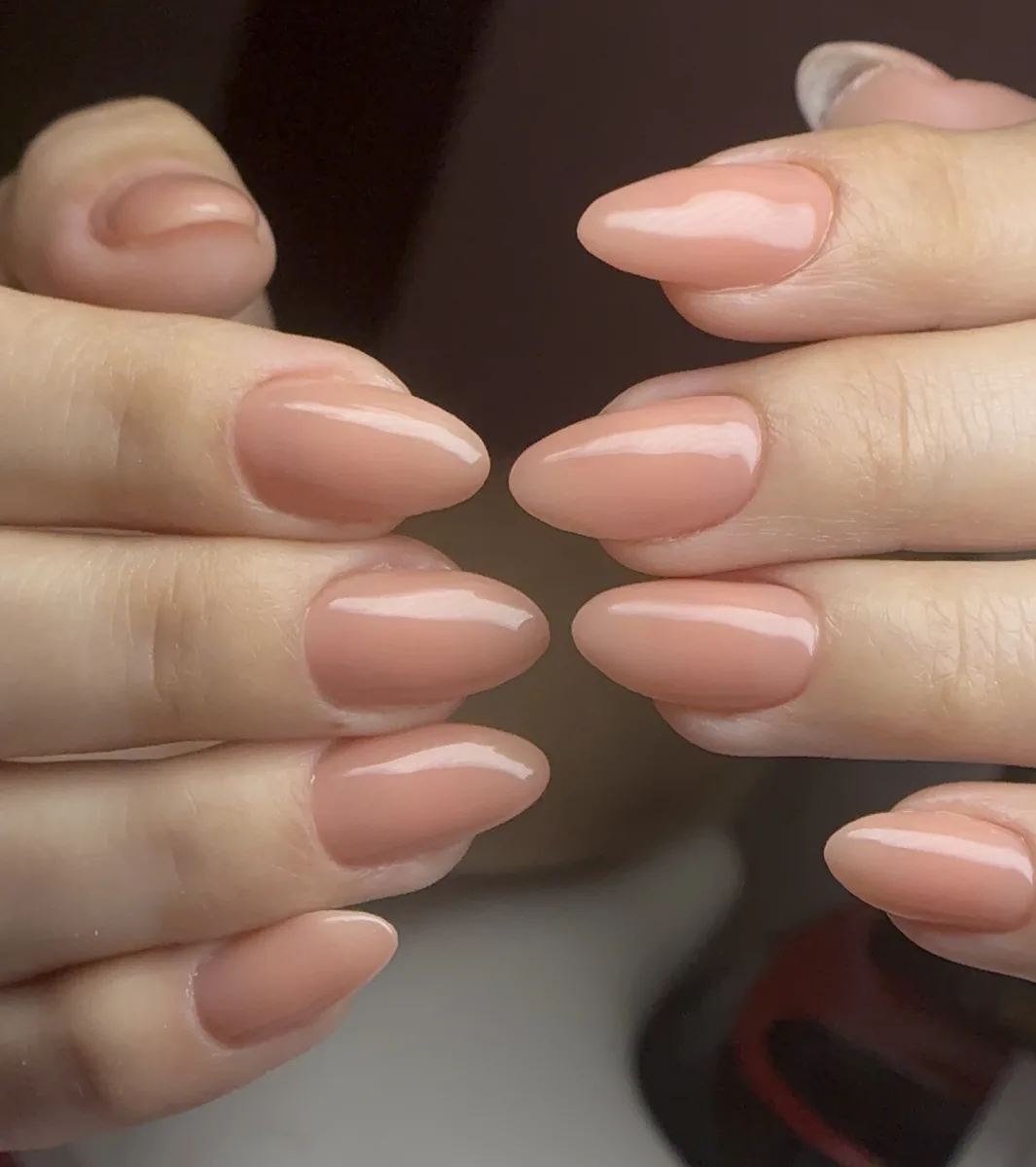 Nude peach almond Builder Gel nails with a glossy natural finish by Polished by Kim