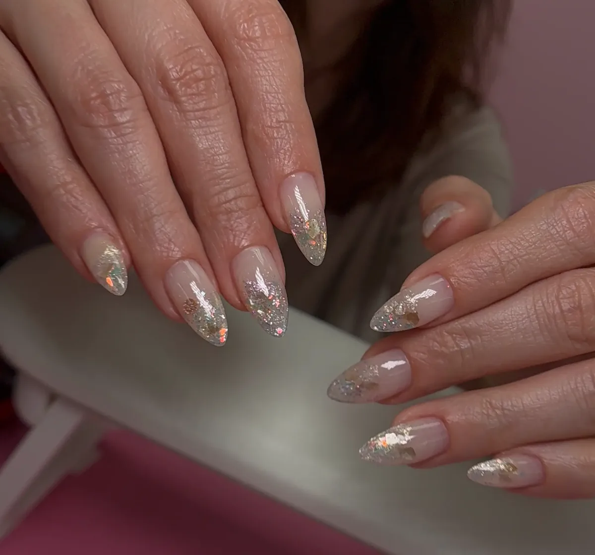 Holographic glitter tip nails on almond shape — prom nail idea from Polished by Kim