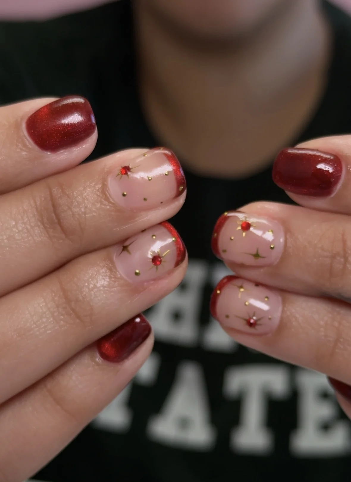 Elegant nude nails with gold glitter accent